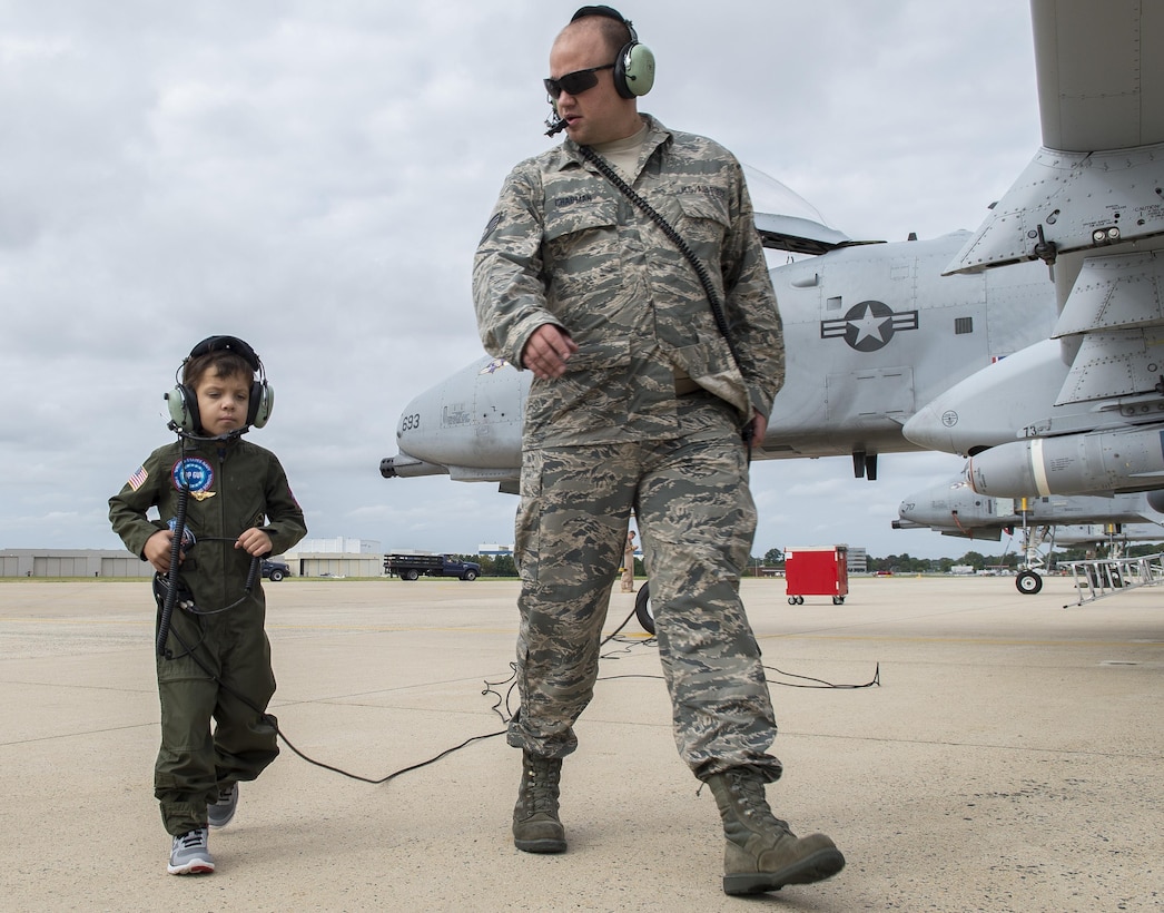 Jack Kirkbride conducts a precheck of the aircraft with an Air Force crew chief assigned to the 104th Fighter Wing, prior to takeoff on the Warfield Air National Guard runway in Middle River, Maryland, Sept. 17, 2016. Jack was given honorary wings and a lifetime membership to the Maryland Air National Guard 175th Fighter Wing.