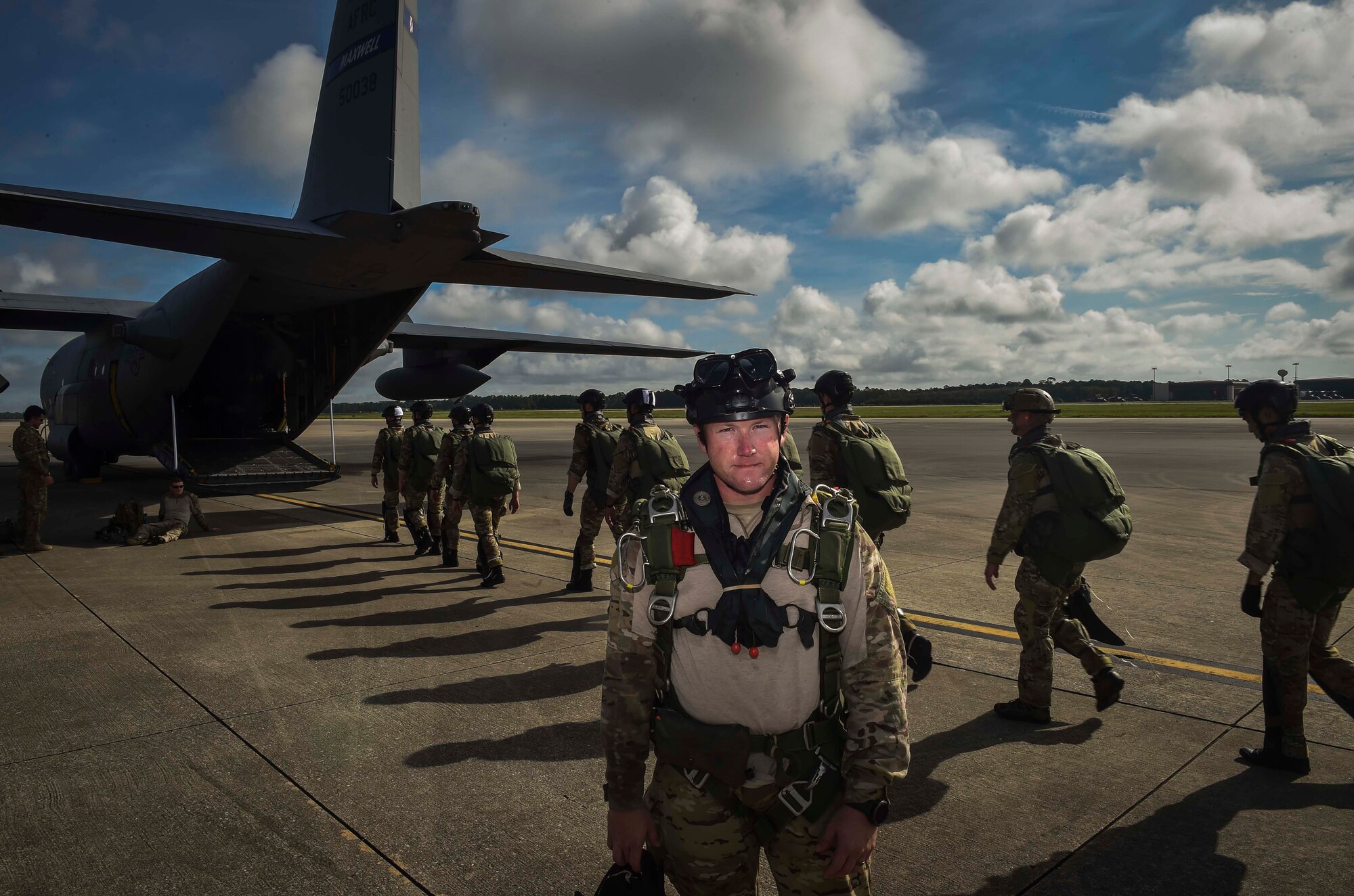Master Sgt. Marcus Mader, a tactical air control party Airman, poses for a photograph before boarding an aircraft for a military free-fall exercise at Hurlburt Field, Fla., Aug. 18, 2016. Mader, was selected as the Air Force's Outstanding Senior NCO of the Year for 2016. (U.S. Air Force photo by Senior Airman Ryan  Conroy) 