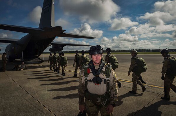 Master Sgt. Marcus Mader, a tactical air control party Airman, poses for a photograph before boarding an aircraft for a military free-fall exercise at Hurlburt Field, Fla., Aug. 18, 2016. Mader, was selected as the Air Force's Outstanding Senior NCO of the Year for 2016. (U.S. Air Force photo by Senior Airman Ryan  Conroy) 