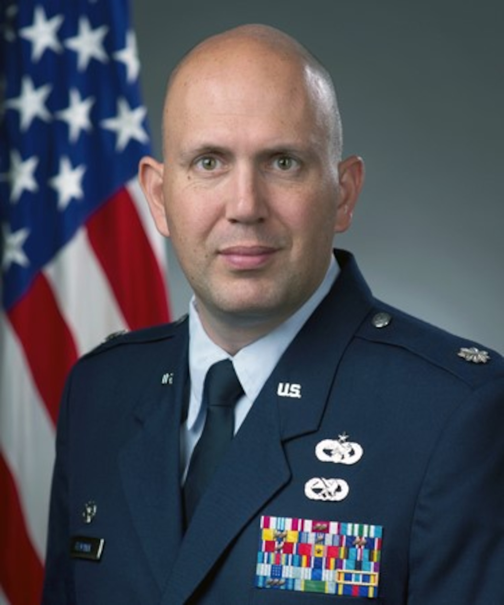 Lt. Col. Michael Tiemann, 60th Air Mobility Wing director of staff, poses for his official photo. (Courtesy photo)