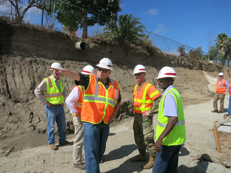 Resident Engineer Pete Gauer describes ongoing flood risk reduction work in Old Town Temecula, California, during a Sept. 22 visit to the to site by Los Angeles District Commander Col. Kirk Gibbs.