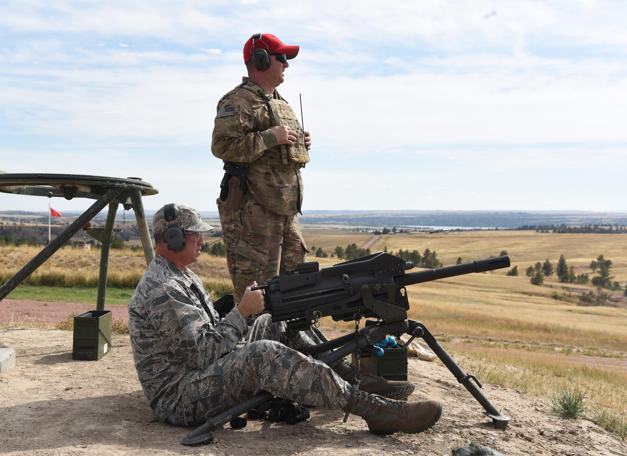 Col. Colin Connor, 91st Missile Wing commander, fires an MK-19 automatic grenade launcher during the fall 20th Air Force Senior Leadership Conference at Camp Guernsey, Wyo., Sept. 19, 2016. 20th AF wing commanders and command chiefs took turns testing the weapons used by security forces Airmen. The conference gave 20th AF leadership an opportunity to work together to continually improve mission performance.