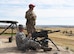 Col. Colin Connor, 91st Missile Wing commander, fires an MK-19 automatic grenade launcher during the fall 20th Air Force Senior Leadership Conference at Camp Guernsey, Wyo., Sept. 19, 2016. 20th AF wing commanders and command chiefs took turns testing the weapons used by security forces Airmen. The conference gave 20th AF leadership an opportunity to work together to continually improve mission performance.