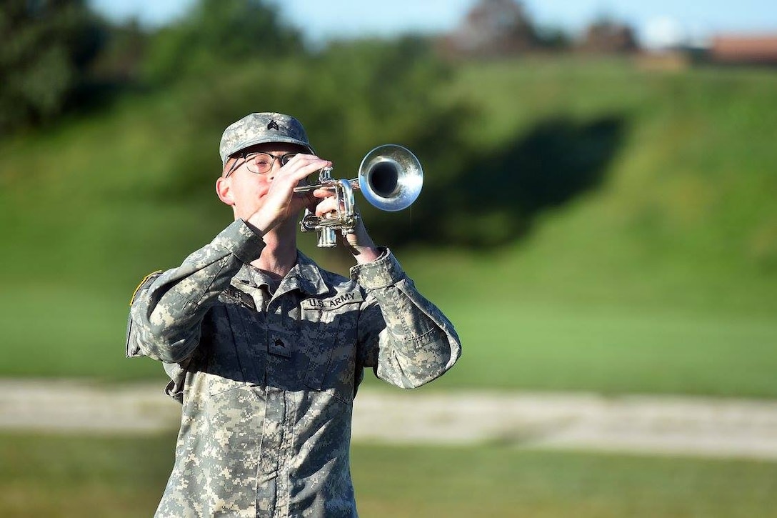 Army Reserve Sgt. Matthew Foster, 85th Army Band, performs during the 85th Support Command's 9/11 15-year remembrance ceremony at the command headquarters, September 11, 2016.
(Photo by Sgt. Aaron Berogan)