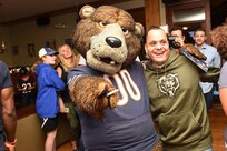 Staley Da Bear, left, Chicago Bears mascot, points to the camera with Army Reserve Sgt. 1st Class during the Chicago Bears 'Bears Bowl' event in Northbrook, Illinois, September 13, 2016. More than 12 soldiers and family members attended the event meeting Bears team players.
(Photo by Mr. Anthony L. Taylor)