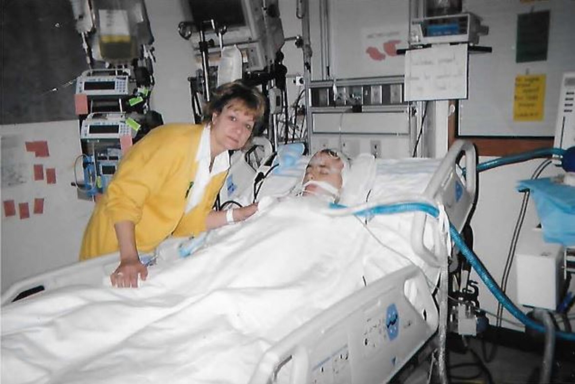 Linda Roose (left) and Josh Roose, family members of Master Sgt. Brittany Jones, 4th Fighter Wing public affairs NCO-in-charge of command information, are photographed at Children’s Hospital in Columbus, Ohio in May 2005. Josh was shot in the head and nearly died from the incident. (Courtesy photo)