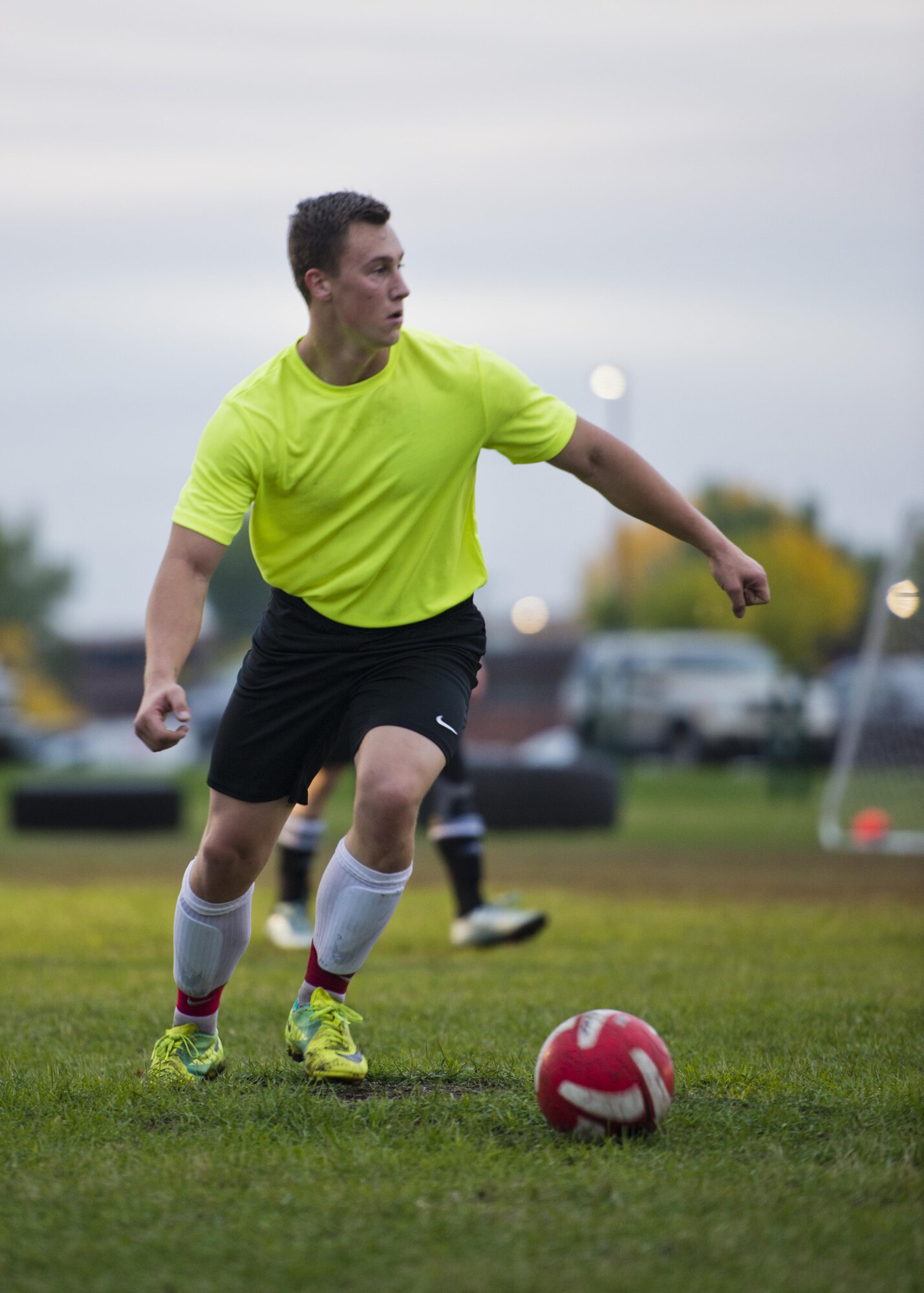 A member of the 5th Security Forces Squadron dribbles the ball during the intramural soccer championship tournament at Minot Air Force Base, N.D., Sept. 21, 2016. The 91st Missile Security Forces Squadron advanced to the next round, beating the 5th Security Forces Squadron.  (U.S. Air Force photo/Airman 1st Class J.T. Armstrong)
