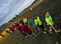 The 5th Security Forces Squadron (yellow) and the 91st Missile Security Forces Squadron (red) shake hands during the first game in the intramural soccer championship tournament at Minot Air Force Base, N.D., Sept. 21, 2016. The 91st MSFS advanced to the next round against the 5th Maintenance Squadron. (U.S. Air Force photo/Airman 1st Class J.T. Armstrong)