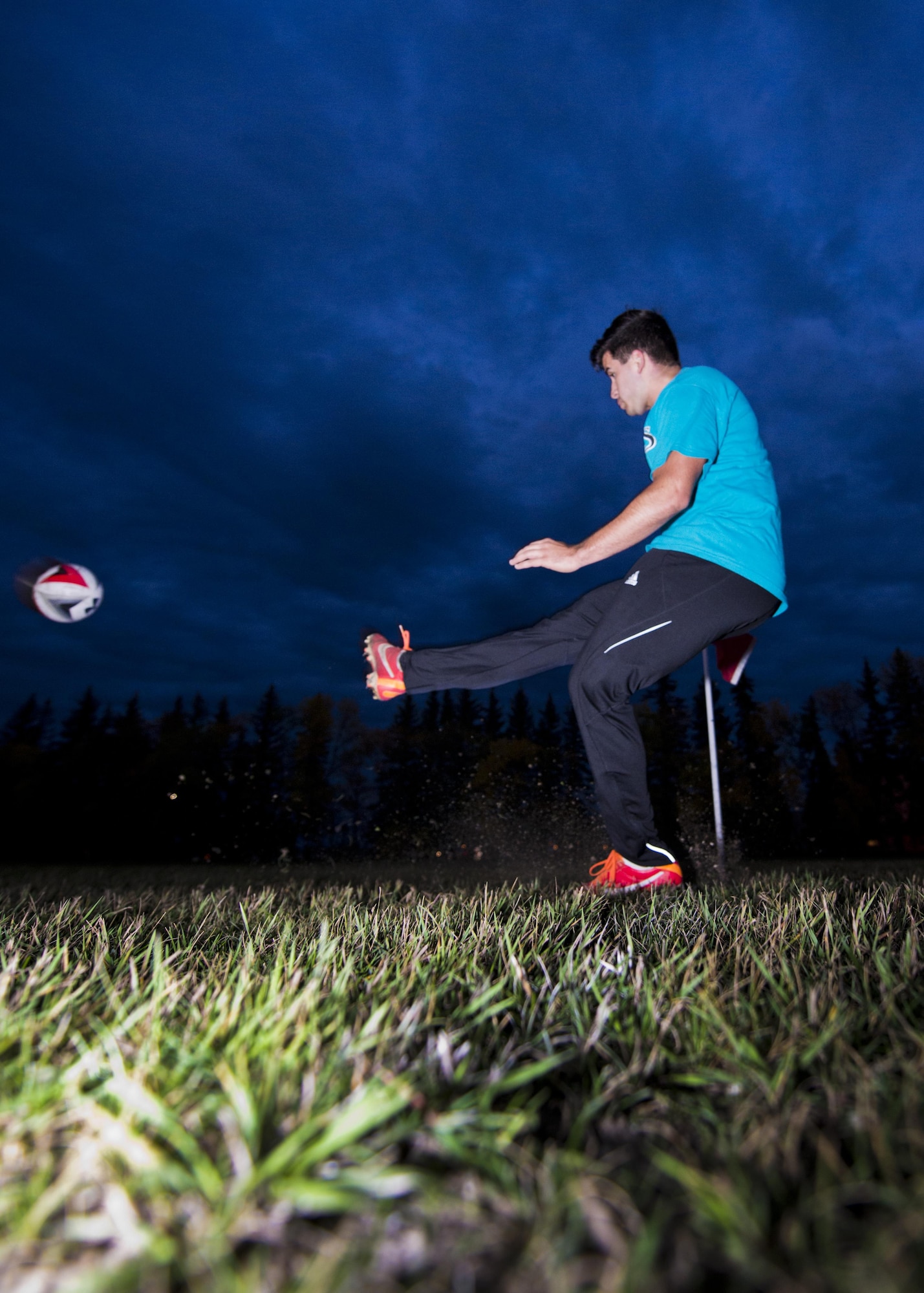 A member of the 5th Maintenance Squadron takes a corner kick during the final game of the intramural soccer championship tournament at Minot Air Force Base, N.D., Sept. 21, 2016. The 91st Missile Security Force Squadron faced the 5th MXS for the intramural soccer trophy. (U.S. Air Force photo/Airman 1st Class J.T. Armstrong) 
