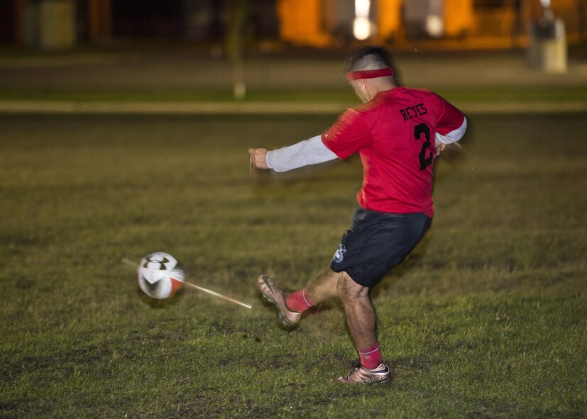 A member of the 91st Missile Security Forces Squadron kicks the ball during the final game of the intramural soccer championship tournament at Minot Air Force Base, N.D., Sept. 21, 2016. The 91st MSFS lost to the 5th Maintenance squadron in the final game of the championship. (U.S. Air Force photo/Airman 1st Class J.T. Armstrong) 