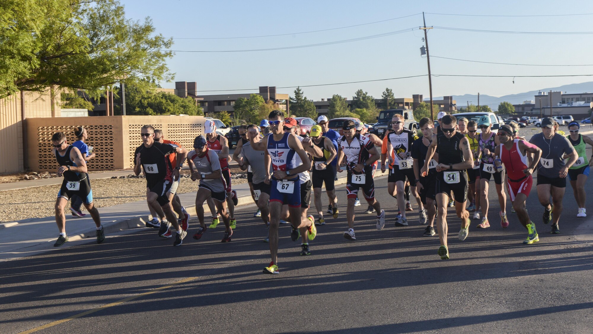 A group of athletes race during Holloman’s eighth annual Monster Triathlon at Holloman Air Force Base, N.M. on Sept. 17, 2016. Holloman’s first Monster Triathlon was held in 2009. (U.S. Air Force photo by Airman 1st Class Alexis P. Docherty) 