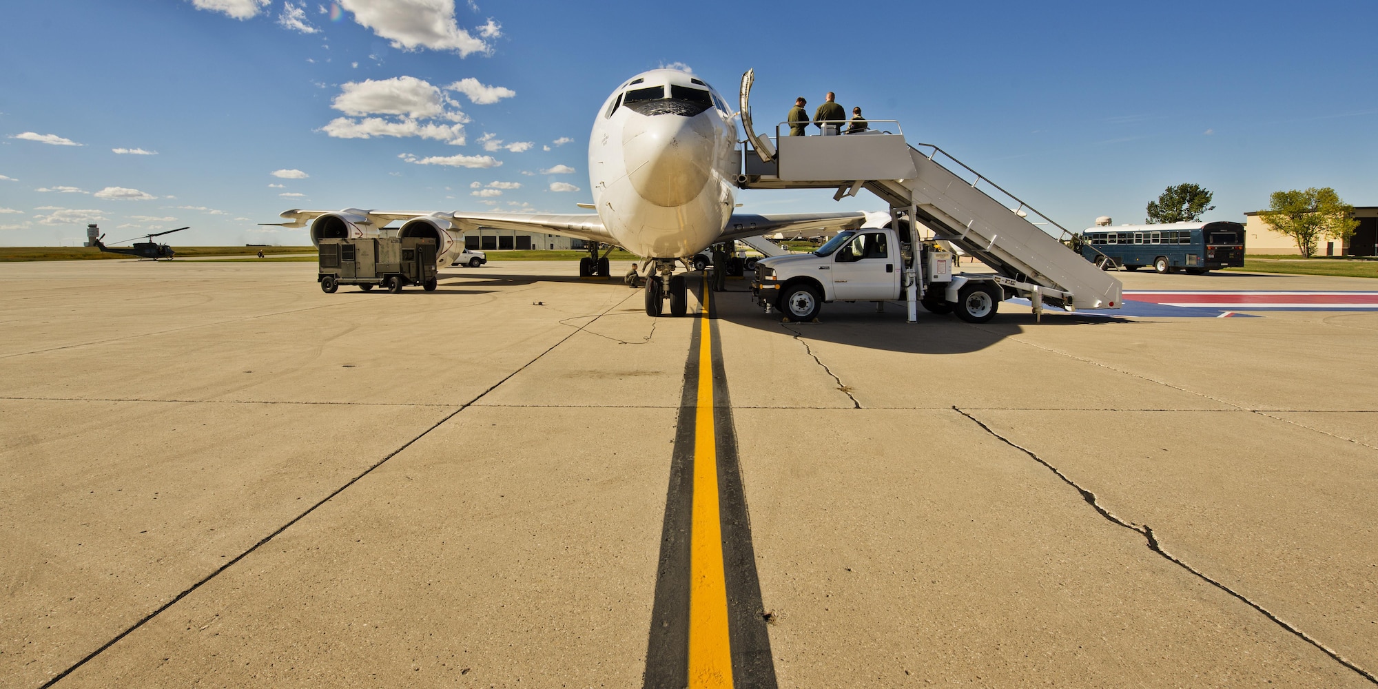 A U.S. Navy E6-B Mercury sits at Base Operations during a tour at Minot Air Force Base, N.D., Sept 19, 2016. The E6-B is primarily used as a n airborne communications platform, using two trailing antenna wires  to aid in communication relay to submarines. (U.S. Air Force photo/Airman 1st Class J.T. Armstrong)