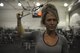 Christy Tharp, an Air Force wife, performs an arm workout at Hurlburt Field, Fla., Sept. 22, 2016. Retirees and dependents can apply at the Commando Fitness Center by filling out a statement of understanding and being issued an access card. (U.S. Air Force photo by Airman Dennis Spain)
