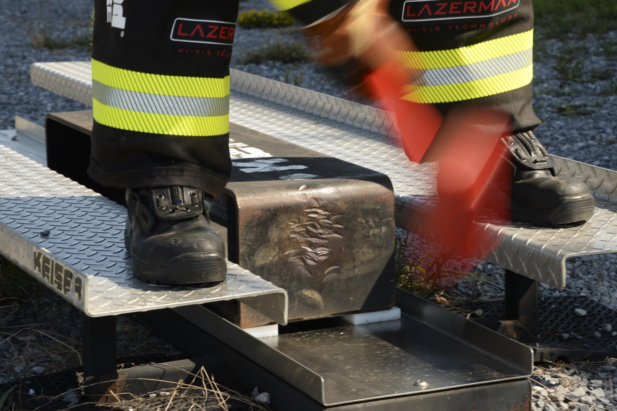 Airman 1st Class Travis Dyer, Maxwell firefighter, simulates chopping while training for the 2016 Scott Firefighter Combat Challenge, Sept. 16, 2016, Maxwell Air Force Base, Ala. The competition consists of five strenuous tasks that must be completed within two minutes. (U.S. Air Force photo/ SrA Alexa Culbert) 