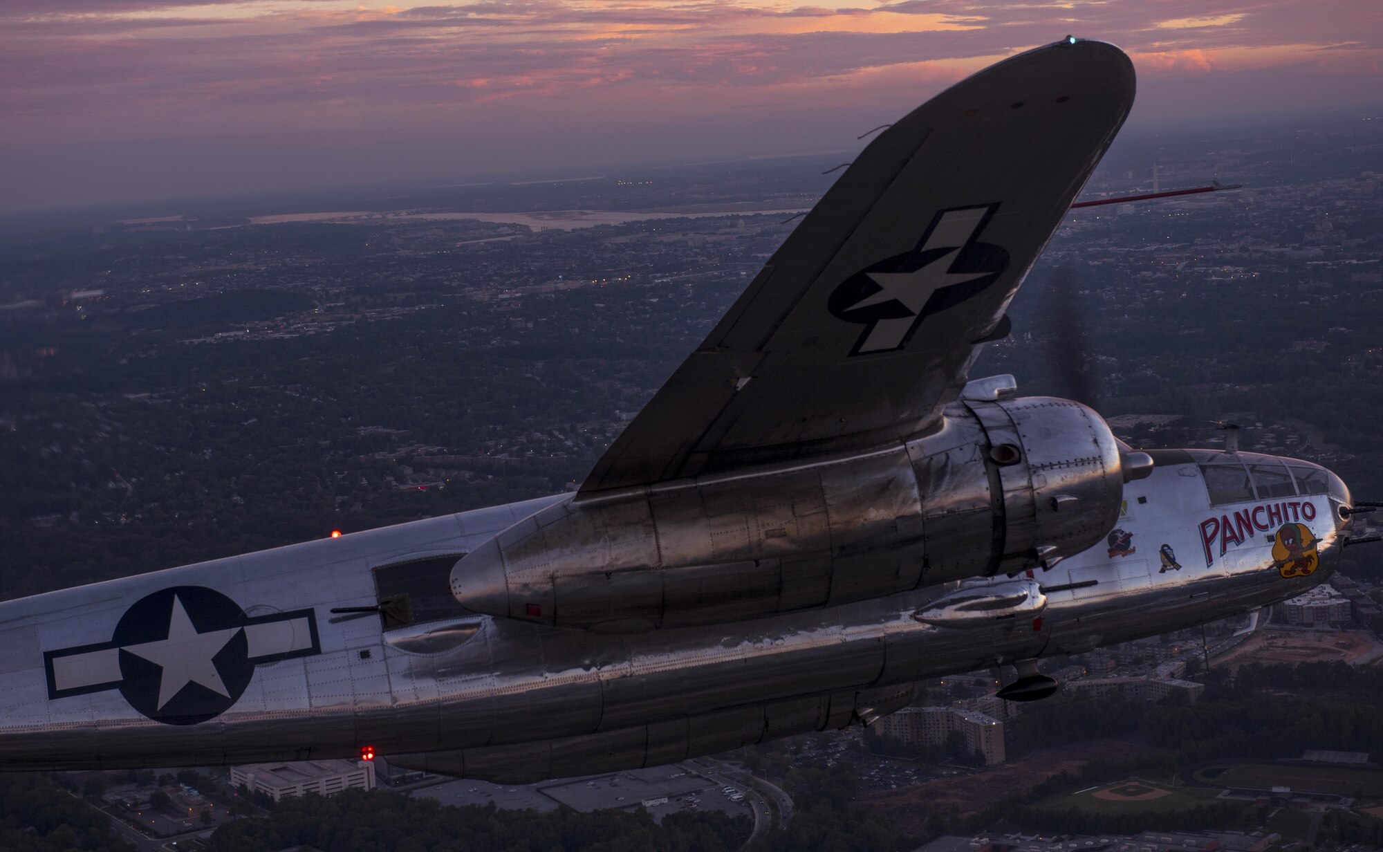 A B-25 Mitchell flies over the National Capital Region for a military tattoo held at Joint Base Anacostia-Bolling, Washington, D.C., Sept. 22, 2016. The B-25 was part of the “Warbirds” tribute flight participating in the 2016 U.S. Air Force Tattoo celebrating the 69th birthday of the U.S. Air Force. 