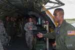 U.S. Air Force Tech Sgt. Erickson Cristobal, 18th Aeromedical Evacuation Squadron aeromedical technician, explains his role in the aeromedical mission to students attending the Joint Professional Military Education Okinawa Experience Sept. 21, 2016, at Kadena Air Base, Japan. The Joint PME gives enlisted leaders the opportunity to get a better grasp of other service’s mission and role in the Pacific. 