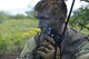 U.S. Air Force 1st Lt. Jaron Jablonski, 55th Rescue Squadron HH-60G Pave Hawk co-pilot, contacts rescue assets during a search and rescue exercise at Outlaw/Jackal military operations area in southeastern Ariz., Sept. 15, 2016. Jablonski played a downed pilot during the exercise and remained in constant communication with rescue assets until they arrived. (U.S. Air Force photo by Senior Airman Cheyenne A. Powers) 