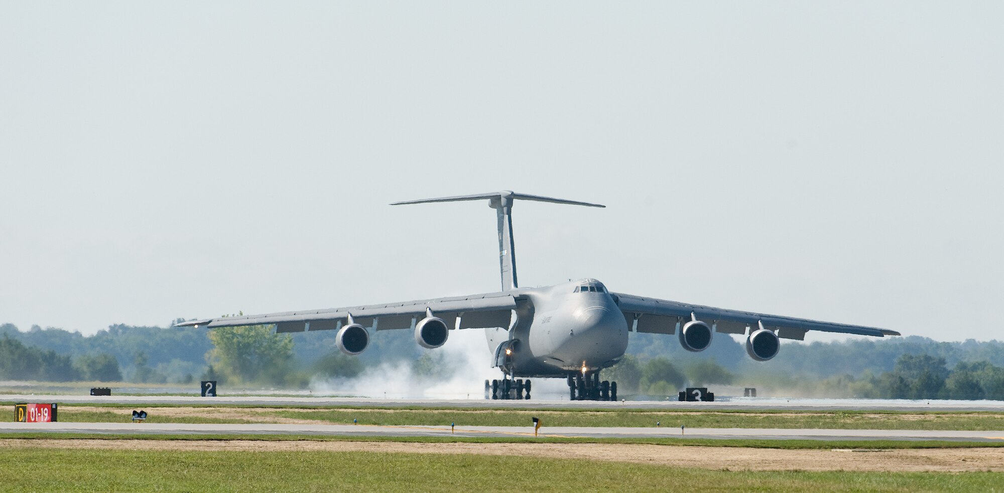 A C-5M Super Galaxy lands on Runway 01-19 Sept. 23, 2016, on Dover Air Force Base, Del. Soon after a ribbon cutting ceremony hosted by 436th and 512th Airlift Wing senior leadership, this C-5M assigned to Dover AFB was the first aircraft to land on the newly reconstructed 9,602 foot-long runway since it was closed in February 2015. (U.S. Air Force photo by Roland Balik)