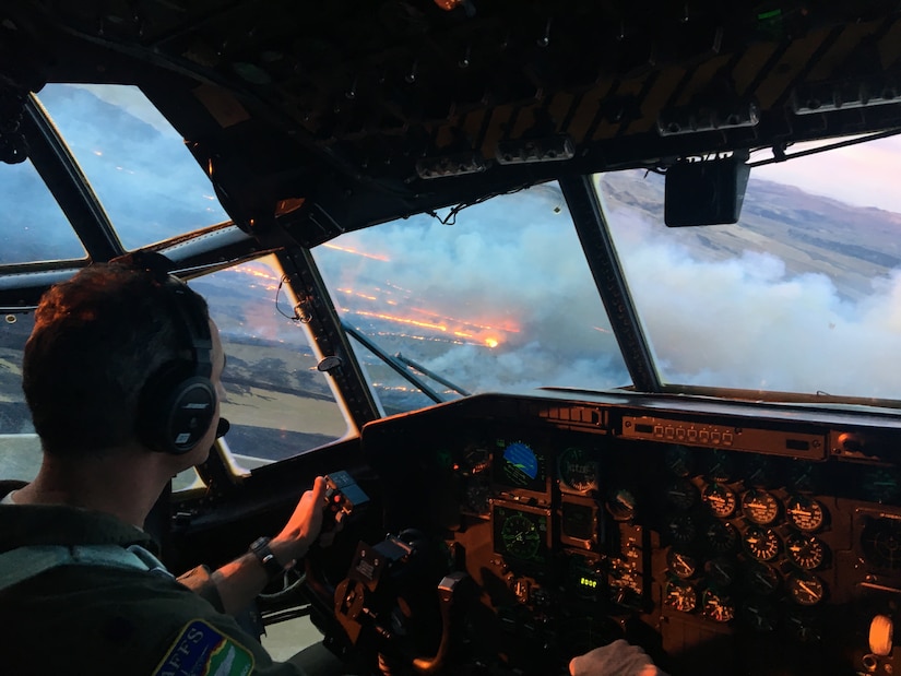 A MAFFS-equipped C-130, assigned to the Air Force Reserve Command’s 302nd Airlift Wing approaches the Power Line fire near Pocatello, Idaho, Aug. 10, 2016.  Aircraft and aircrews from the Air Force Reserve Command’s 302nd Airlift Wing, Peterson Air Force Base, Colo. and the Wyoming Air National Guard’s 153rd Airlift Wing, Cheyenne, Wyo. provided MAFFS capabilities requested by the U.S. Forest Service, supporting aerial fire fighting suppression efforts to fires in Idaho, Oregon, Nevada and Utah Aug. 3 to Sep. 3. (U.S. Air Force photo/Lt. Col. Frank Wilde)