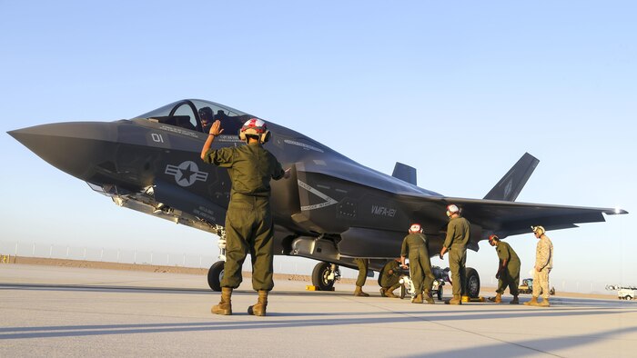 U.S. Marines with Marine Fighter Attack Squadron 121, 3rd Marine Aircraft Wing, conduct the first ever hot load on the F-35B Lightning II in support of Weapons and Tactics Instructor Course 1-17 at Marine Corps Air Station Yuma, Ariz., Sept. 22, 2016. The exercise is part of WTI 1-17, a seven-week training event hosted by Marine Aviation Weapons and Tactics Squadron One cadre. MAWTS-1 provides standardized tactical training and certification of unit instructor qualifications to support Marine Aviation Training and Readiness and assists in developing and employing aviation weapons and tactics.