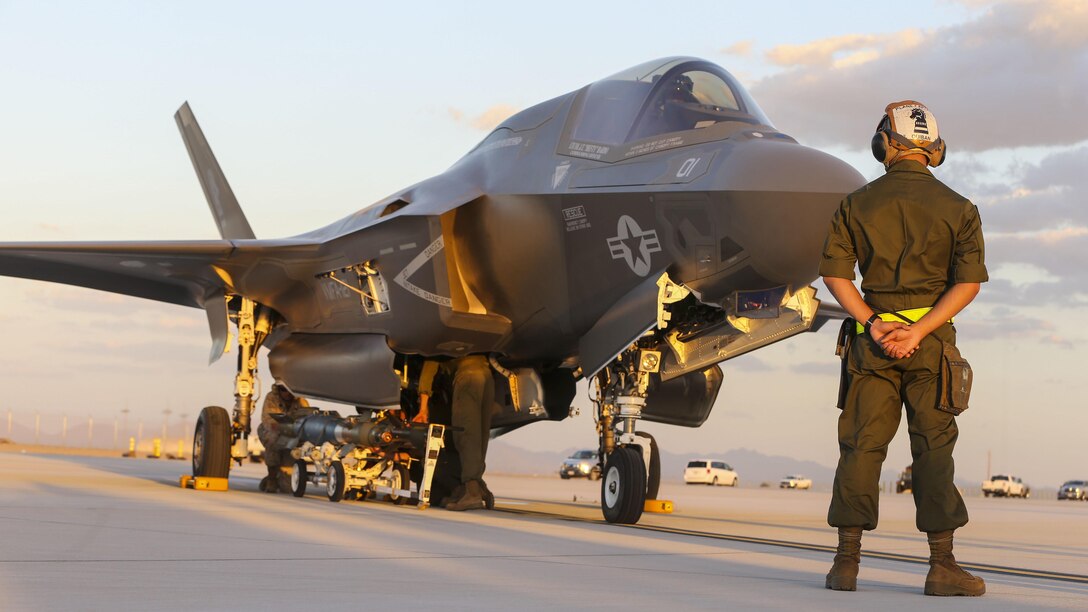 U.S. Marines with Marine Fighter Attack Squadron 121, 3rd Marine Aircraft Wing, conduct the first ever hot load on the F-35B Lightning II in support of Weapons and Tactics Instructor Course 1-17 at Marine Corps Air Station Yuma, Ariz., Sept. 22, 2016. The exercise is part of WTI 1-17, a seven-week training event hosted by Marine Aviation Weapons and Tactics Squadron One cadre. MAWTS-1 provides standardized tactical training and certification of unit instructor qualifications to support Marine Aviation Training and Readiness and assists in developing and employing aviation weapons and tactics.