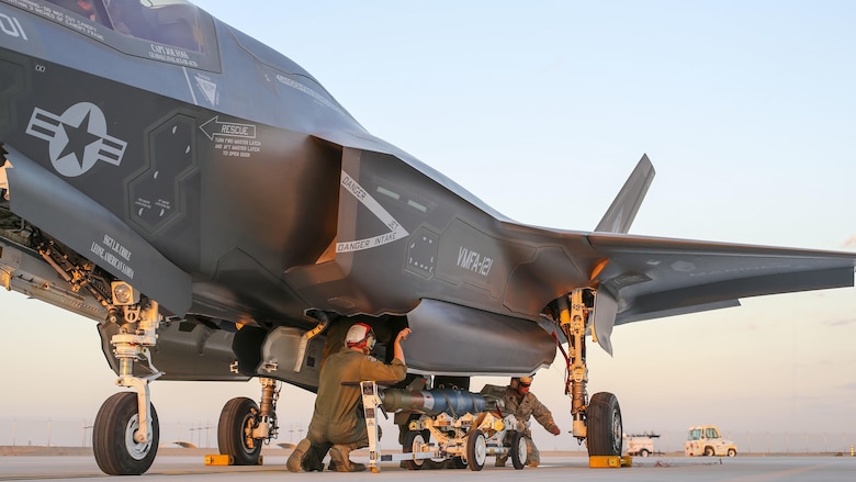 U.S. Marines with Marine Fighter Attack Squadron 121, 3rd Marine Aircraft Wing, conduct the first ever hot load on the F-35B Lightning II in support of Weapons and Tactics Instructor Course 1-17 at Marine Corps Air Station Yuma, Ariz., Sept. 22, 2016. The exercise is part of WTI 1-17, a seven-week training event hosted by Marine Aviation Weapons and Tactics Squadron One cadre. MAWTS-1 provides standardized tactical training and certification of unit instructor qualifications to support Marine Aviation Training and Readiness and assists in developing and employing aviation weapons and tactics.