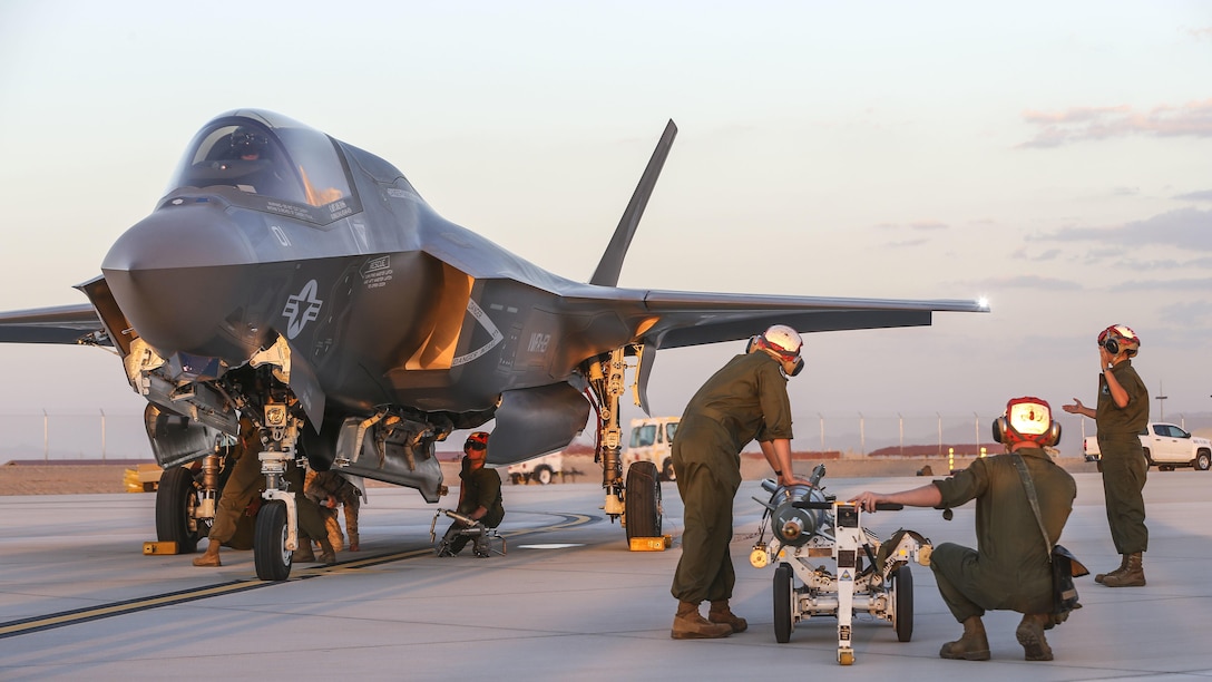 U.S. Marines with Marine Fighter Attack Squadron 121, 3rd Marine Aircraft Wing, conduct the first ever hot load on the F-35B Lightning II in support of Weapons and Tactics Instructor Course 1-17 at Marine Corps Air Station Yuma, Ariz., Sept. 22, 2016. The exercise is part of WTI 1-17, a seven-week training event hosted by Marine Aviation Weapons and Tactics Squadron One cadre. MAWTS-1 provides standardized tactical training and certification of unit instructor qualifications to support Marine Aviation Training and Readiness and assists in developing and employing aviation weapons and tactics.