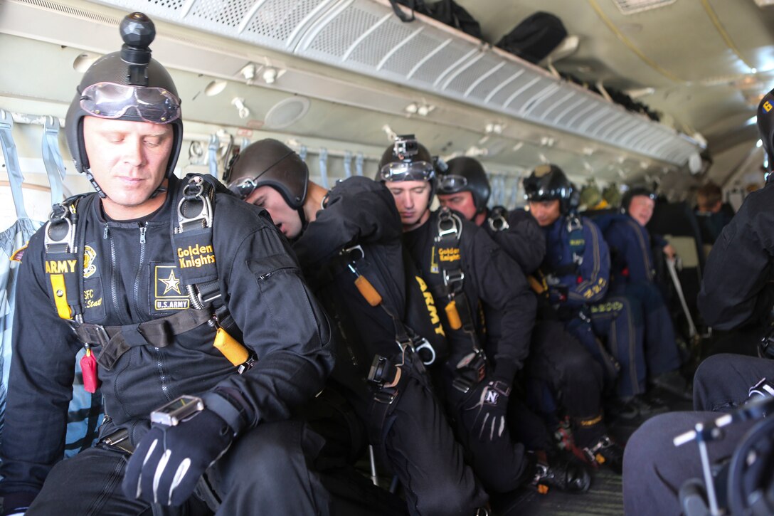 The U.S. Army Golden Knights parachute team prepares to jump during the 2016 MCAS Miramar Air Show aboard Marine Corps Air Station Miramar, Calif., Sept. 23. The Golden Knights jump from a C-31A Troopship at an altitude of more than 12,000 feet. The MCAS Miramar Air Show showcases world-class performers, military flight demonstration teams, the capabilities of the Marine Air-Ground Task Force and celebrates Miramar’s longstanding relationship with the local San Diego community. (U.S. Marine Corps photo by Lance Cpl. Harley Robinson/Released)