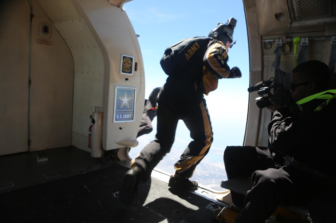 A member of the U.S. Army Golden Knights jumps during the 2016 MCAS Miramar Air Show aboard Marine Corps Air Station Miramar, Calif., Sept. 23. The Golden Knights jump from a C-31A Troopship at an altitude of more than 12,000 feet. The MCAS Miramar Air Show showcases world-class performers, military flight demonstration teams, the capabilities of the Marine Air-Ground Task Force and celebrates Miramar’s longstanding relationship with the local San Diego community. (U.S. Marine Corps photo by Lance Cpl. Harley Robinson/Released)
