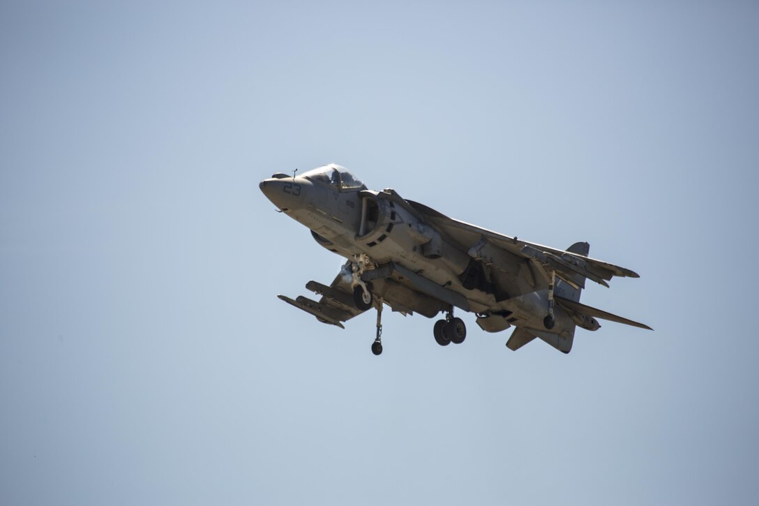 An AV-8B Harrier hovers above the flight line during its demonstration at the 2016 MCAS Miramar Air Show aboard Marine Corps Air Station Miramar, Calif., Sept. 23. The Harrier also played a role in the Marine Air-Ground Task Force demonstration. The MCAS Miramar Air Show showcases world-class performers, military flight demonstration teams, the capabilities of the Marine Air-Ground Task Force and celebrates Miramar’s longstanding relationship with the local San Diego community. (U.S. Marine Corps photo by Pfc. Liah Kitchen/Released)