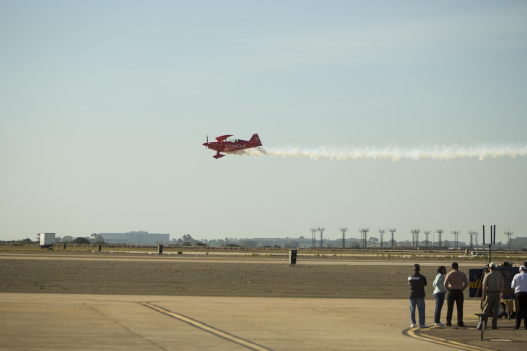 Sean D. Tucker, pilot of the Oracle Challenger, glides above the flight line during the 2016 MCAS Miramar Air Show aboard Marine Corps Air Station Miramar, Calif., Sept. 23. Tucker has flown more than 1,200 performances at over 475 air shows since the 1970s. The MCAS Miramar Air Show showcases world-class performers, military flight demonstration teams, the capabilities of the Marine Air-Ground Task Force and celebrates Miramar’s longstanding relationship with the local San Diego community. (U.S. Marine Corps photo by Pfc. Liah Kitchen/Released)