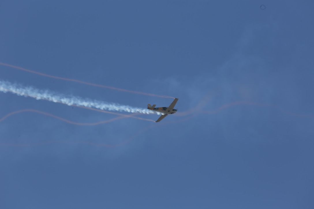 Pilot Steve Stavrakakis performs “A Tribute to the American Vet” in a Romanian IAR-823 during the 2016 MCAS Miramar Air Show aboard Marine Corps Air Station Miramar, Calif., Sept. 23. The IAR is painted in Air Force jungle camouflage colors and the markings of the 8th Special Operations Squadron stationed at Bien Hoa Air Base, Vietnam, in 1970. The MCAS Miramar Air Show showcases world-class performers, military flight demonstration teams, the capabilities of the Marine Air-Ground Task Force and celebrates Miramar’s longstanding relationship with the local San Diego community. (U.S. Marine Corps photo by Pfc. Jacob Pruitt/Released)