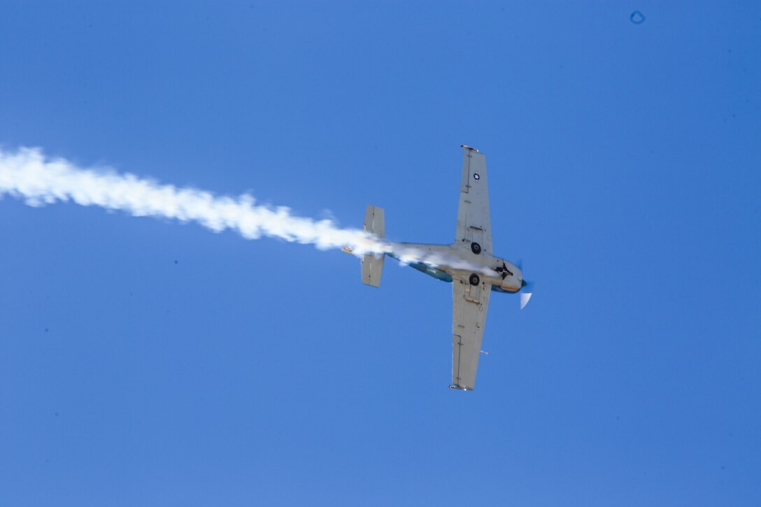 Pilot Steve Starvrakakis performs “A Tribute to the American Vet” in a Romanian IAR-823 during the 2016 MCAS Miramar Air Show aboard Marine Corps Air Station Miramar, Calif., Sept. 23. The IAR is painted in Air Force jungle camouflage colors and the markings of the 8th Special Operations Squadron stationed at Bien Hoa Air Base, Vietnam, in 1970. The MCAS Miramar Air Show showcases world-class performers, military flight demonstration teams, the capabilities of the Marine Air-Ground Task Force and celebrates Miramar’s longstanding relationship with the local San Diego community. (U.S. Marine Corps photo by Pfc. Jacob Pruitt/Released)