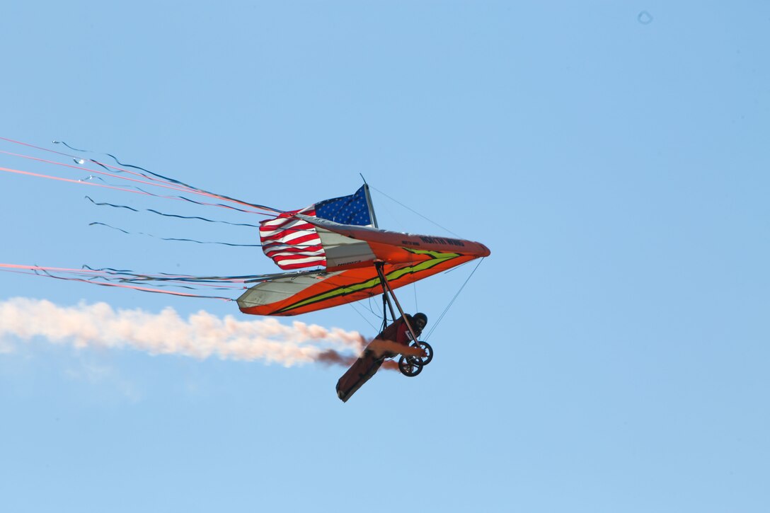 Dan Buchanan pilots a hang glider as part of his performance during the 2016 MCAS Miramar Air Show aboard Marine Corps Air Station Miramar, Calif., Sept. 23. Buchanan lost the use of his legs after suffering a spinal injury in 1981, but has since accrued more than 2,400 flight hours in hang gliders. The MCAS Miramar Air Show showcases world-class performers, military flight demonstration teams, the capabilities of the Marine Air-Ground Task Force and celebrates Miramar’s longstanding relationship with the local San Diego community. (U.S. Marine Corps photo by Pfc. Jacob Pruitt/Released)