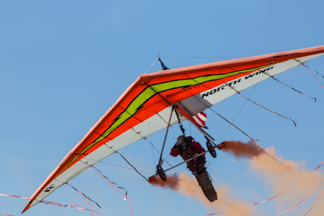 Dan Buchanan colors the sky while piloting his hang glider during the 2016 MCAS Miramar Air Show aboard Marine Corps Air Station Miramar, Calif., Sept. 23. Buchanan lost the use of his legs after suffering a spinal injury in 1981, but has since accrued more than 2,400 flight hours in hang gliders. The MCAS Miramar Air Show showcases world-class performers, military flight demonstration teams, the capabilities of the Marine Air-Ground Task Force and celebrates Miramar’s longstanding relationship with the local San Diego community. (U.S. Marine Corps photo by Pfc. Jacob Pruitt/Released)