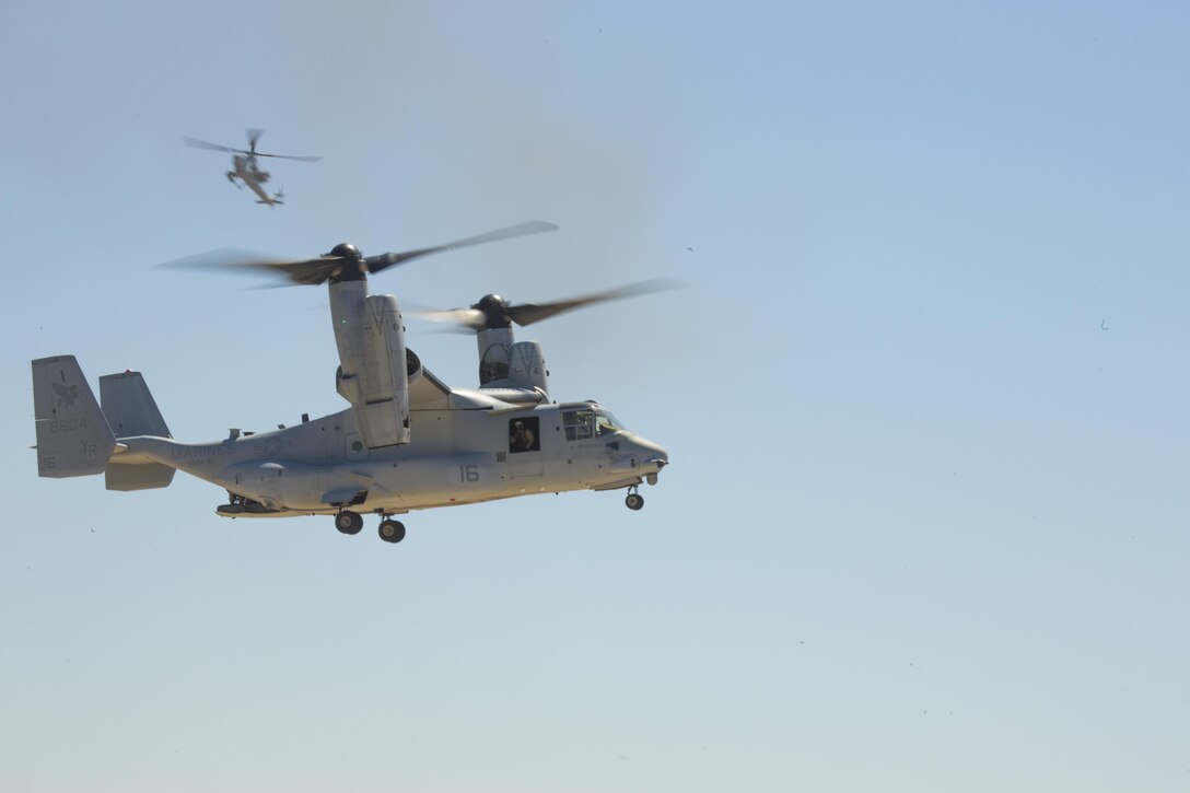 An MV-22B Osprey carries in Marines during the Marine Air-Ground Task Force demonstration during the 2016 MCAS Miramar Air Show aboard Marine Corps Air Station Miramar, Calif., Sept. 24. The MAGTF demonstration displays the coordinated use of close-air support, armor, artillery and infantry forces. The MCAS Miramar Air Show showcases world-class performers, military flight demonstration teams, the capabilities of the Marine Air-Ground Task Force and celebrates Miramar’s longstanding relationship with the local San Diego community. (U.S. Marine Corps photo by Pfc. Liah Kitchen/Released)