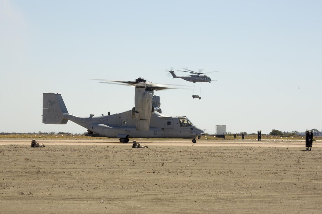 An MV-22B Osprey lands while demonstrating Marine Air-Ground Task Force operations during the 2016 MCAS Miramar Air Show aboard Marine Corps Air Station Miramar, Calif., Sept. 24. The MAGTF demonstration displays the coordinated use of close-air support, armor, artillery and infantry forces. The MCAS Miramar Air Show showcases world-class performers, military flight demonstration teams, the capabilities of the Marine Air-Ground Task Force and celebrates Miramar’s longstanding relationship with the local San Diego community. (U.S. Marine Corps photo by Pfc. Liah Kitchen/Released)