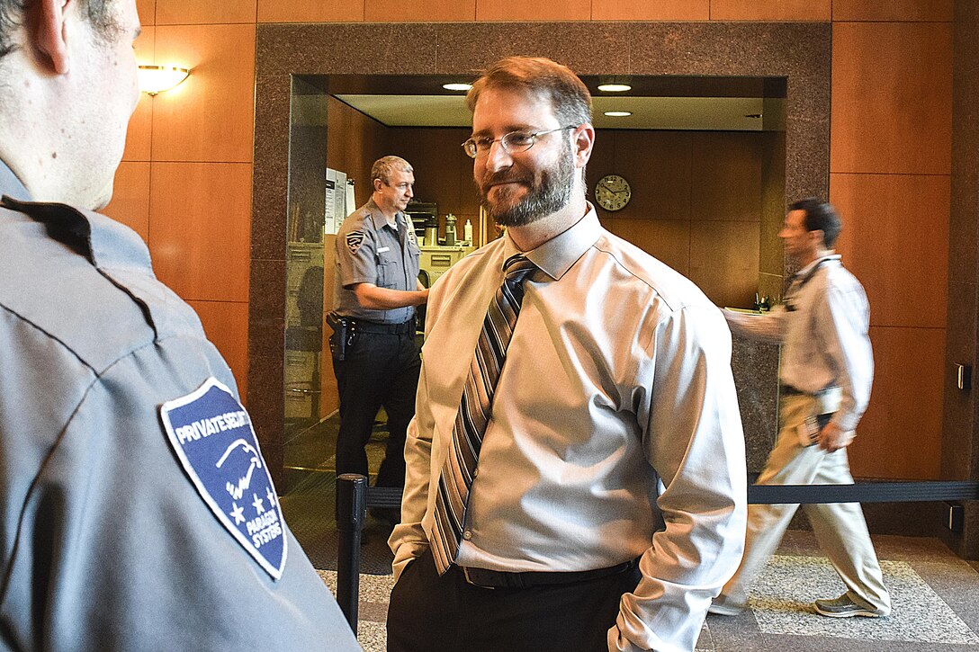 Josh Harmon,chief of security for the U.S. Army Corps of Engineers Sacramento District, speaks to Department of Homeland Security-contracted guards about future security protocols for the district headquarters. Harmon joined the Corps after learning about the security chief vacancy at a Corps-hosted Veterans career fair in April 2016. (U.S. Army photos by Randy Gon / Released)