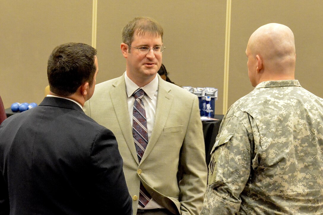 Josh Harmon speaks to U.S. Army Corps of Engineers employees during a Veterans career fair in downtown Sacramento in April 2016. The Corps-hosted event assembled career advisers from private, state and federal government agencies to speak with prior service members about potential employment opportunities. (U.S. Army photos by Randy Gon / Released)
