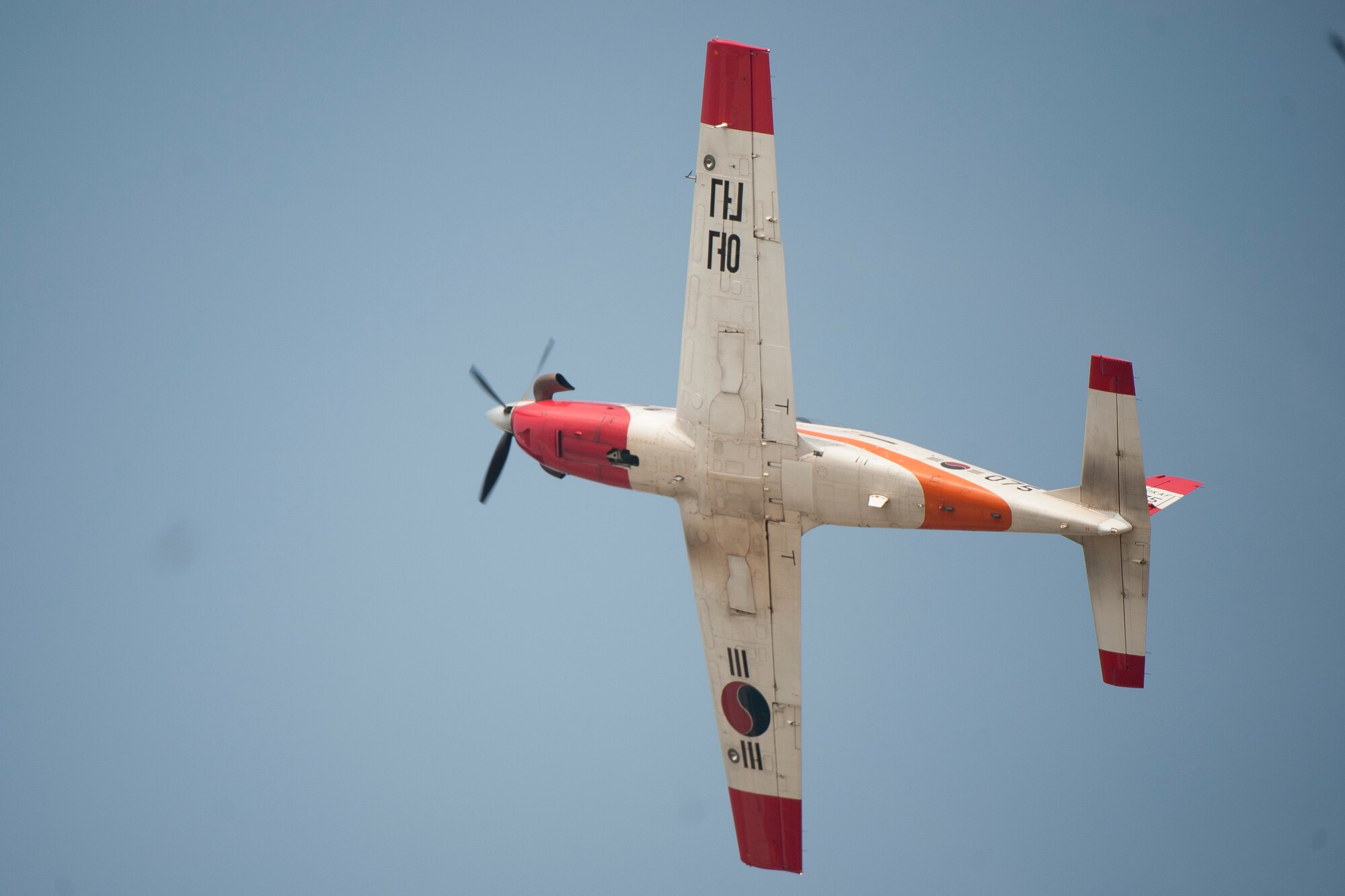 A Republic of Korea KT-1 Woongbi flies by during Air Power Day 2016 on Osan Air Base, Republic of Korea, Sept. 24, 2016. Air Power Day was a chance for U.S. and Korean attendees to get to know one another while watching aerial demonstrations, entertainment and more. (U.S. Air Force photo by Staff Sgt. Jonathan Steffen) 