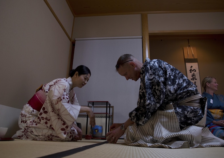 An instructor shows Vernon Williams, right, how to prepare matcha, a Japanese powdered green tea, during a Japanese Tea Ceremony Class at the Yayoi Kimono Shop and Cultural School Sept. 17 in Naha, Okinawa, Japan. Preparing the matcha was the final step in the class that focused on preparation, presentation and etiquette while serving guests. Williams is a Louisa, Kentucky, native.