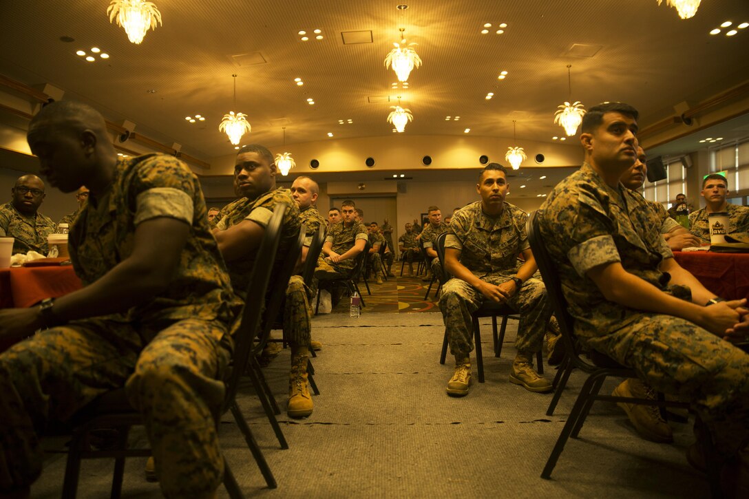 Newly promoted staff sergeants and staff sergeants select attend a Staff Sergeant Indoctrination Course to learn their new responsibilities as a staff noncommissioned officer on Camp Hansen, Okinawa, Sept. 22, 2016. One hundred and sixty Marines participated in the course and were able to ask higher enlisted SNCOs and officers for guidance as they continue advancing their careers. (U.S. Marine Corps photo by Cpl. Natalie Dillon)
