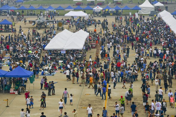Tens of thousands of people attend Air Power Day 2016 at Osan Air Base, Republic of Korea (ROK), Sept. 25, 2016. The air show, which is the first in four years, featured aerial performances from American and ROK acts, music performances from bands including Sublime with Rome, and dozens of food and memorabilia vendors. (U.S. Air Force photo by Senior Airman Victor J. Caputo)