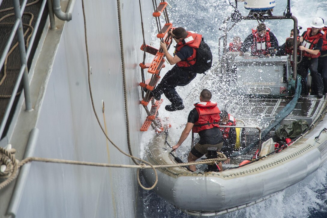 Sailors board a rigid-hull inflatable boat from the USS Germantown during a visit, board, search and seizure exercise in the Philippine Sea, Sept. 21, 2016. The Germantown is participating in Valiant Shield, a biennial exercise focused on integrating joint training among U.S. forces. Navy photo by Petty Officer 2nd Class Raymond D. Diaz III