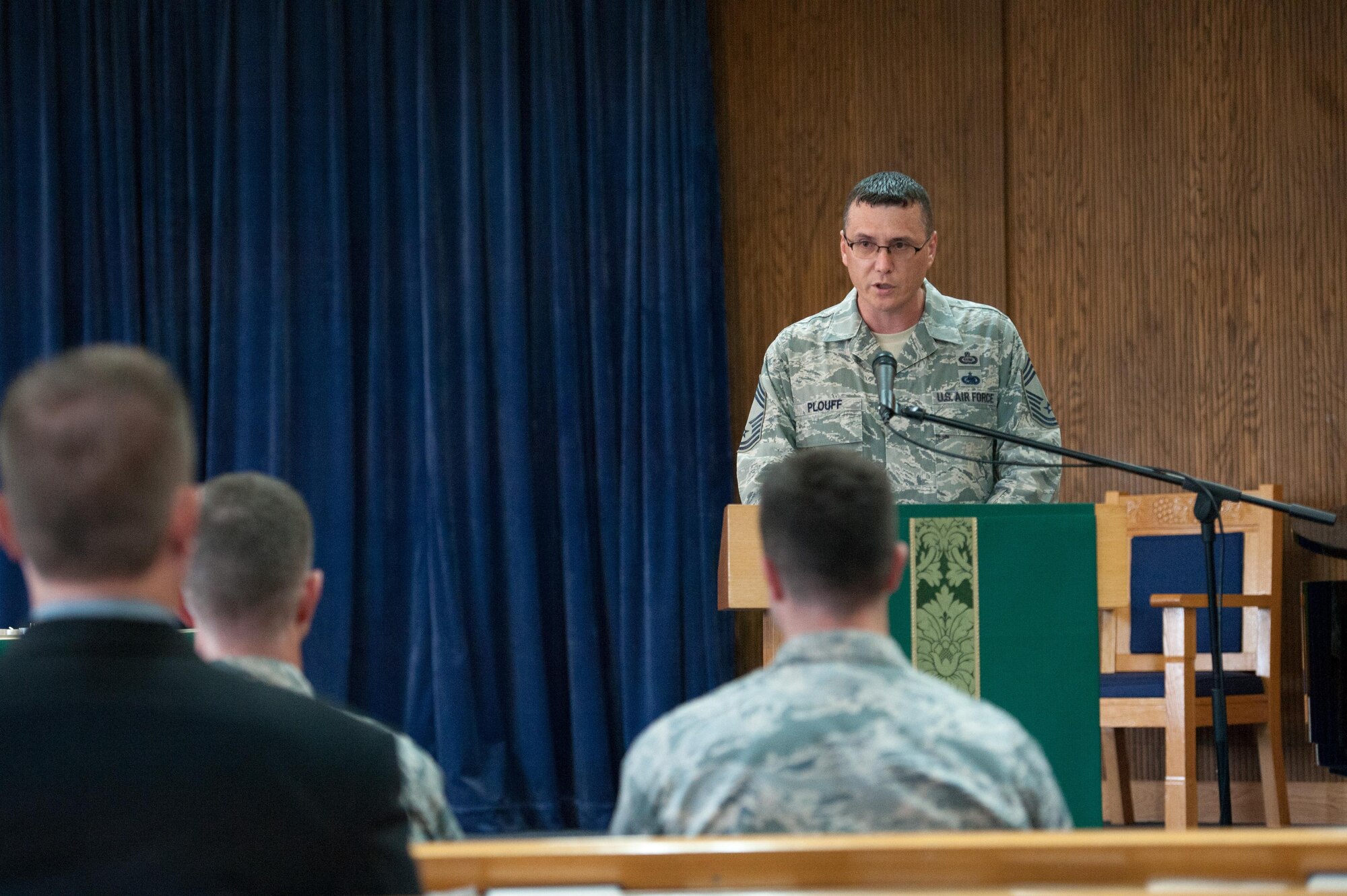 U.S. Air Force Chief Master Sgt. David Plouff, 694th Intelligence, Surveillance and Reconnaissance Group superintendent, gives a speech as guest speaker for a POW/MIA memorial service at Osan Air Base, Republic of Korea, Sept. 15, 2016. The service honored service members who are still missing in action. (U.S. Air Force photo by Staff Sgt. Jonathan Steffen)