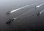 WATERS EAST OF THE KOREAN PENINSULA (Sept. 26, 2016) U.S. Navy and Republic of Korea Navy (ROKN) ships maneuver together during a combined maritime operation. ROKS Seoae Ryusungryong (DDG 993) (lead ship) ROKS Yul Gok Yii (DDG 992), (Clockwise) ROKS Kang Gam Chan (DDH 979) and U.S. Arleigh Burke-class guided-missile destroyer USS Spruance (DDG 111). 