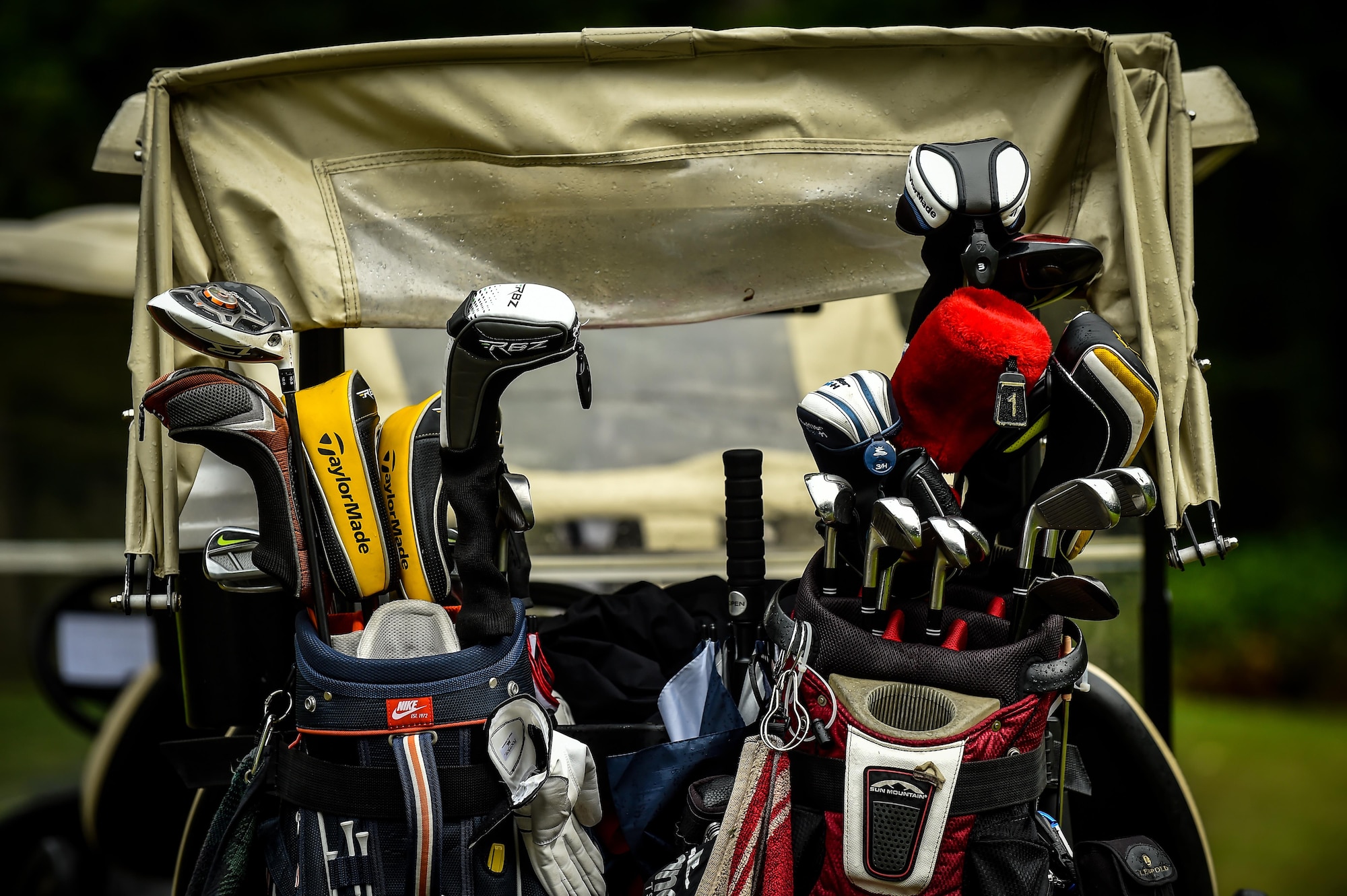 Golf clubs rest in the back of a golf cart during the Army and Air Force Challenge Match golf tournament Sept. 18, 2016 at Rheinblick Golf Course, Wiesbaden, Germany.  The two-day tournament was held at the Woodlawn Golf Course, Ramstein Air Base, Germany and Rheinblick. (U.S. Air Force photo by Senior Airman Nicole Keim)