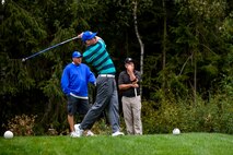 Senior Airman Steven Rogers, 86th Aircraft Maintenance Squadron C-130J Super Hercules crew chief, hits a golf ball during the Army and Air Force Challenge Match golf tournament Sept. 18, 2016, at Rheinblick Golf Course, WiEsbaden, Germany.  The two-day tournament was held at the Woodlawn Golf Course, Ramstein Air Base, Germany and Rheinblick. (U.S. Air Force photo by Senior Airman Nicole Keim)