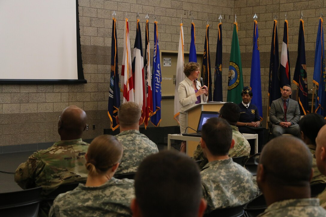 Congresswoman Susan Brooks, U.S. Representative from the 5th District, IN, speaks about the history and achievements of women in the military and U.S. society, as well as women veteran issues during the 310th Sustainment Command (Expeditionary) 2016 Women’s Equality Day Observance, 26 Aug., 2016.