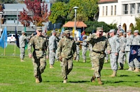 Maj. Gen. Peter Lennon (left), deputy commanding general (support), U.S. Army Reserve Command, Col. Andrew Flagler (middle), inspector general, 63rd Regional Support Command and outgoing 63rd RSC commanding general Nickolas Tooliatos (right), inspect the formations of 63rd RSC public affairs units as part of the 63rd RSC’s change of command ceremony, Sept. 25, Moffett Field, Mountain View, Calif. (U.S. Army Reserve photo by Capt. Alun Thomas)